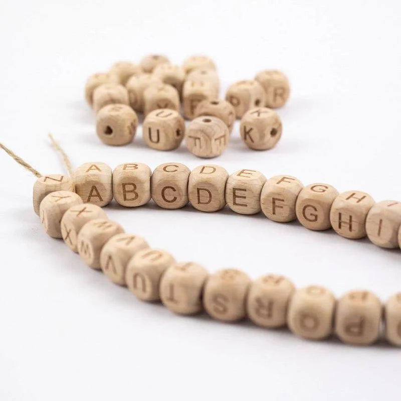 Perline con lettere in legno di faggio 12mm